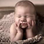 Sovende nyfødt os fotografen